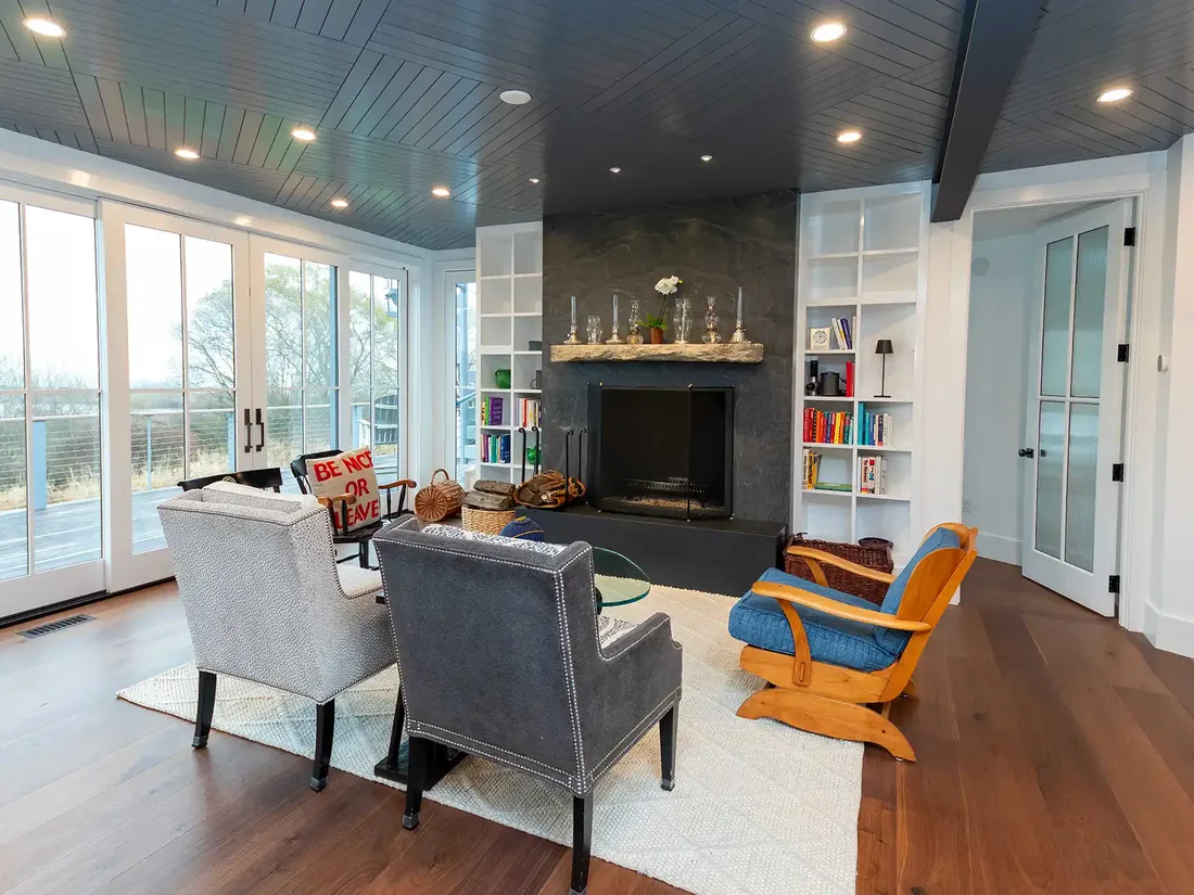 Custom coastal home living room with ocean light and refined finishes