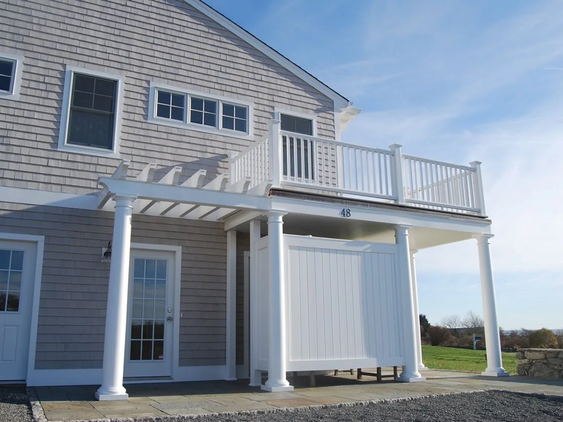 New custom home exterior with clean massing and coastal detailing
